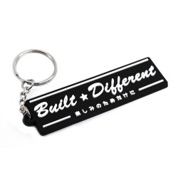 PVC portachiavi "Built Different"